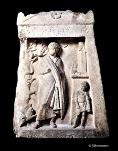 Grabstele von Melitions Sohn Der abgebildete Spitz streckt der Figur seine re. Vorderpfote entgegen, Smyrna, 2. Hälfte des 2. Jh. v. Chr., © Rijksmuseum, Leiden